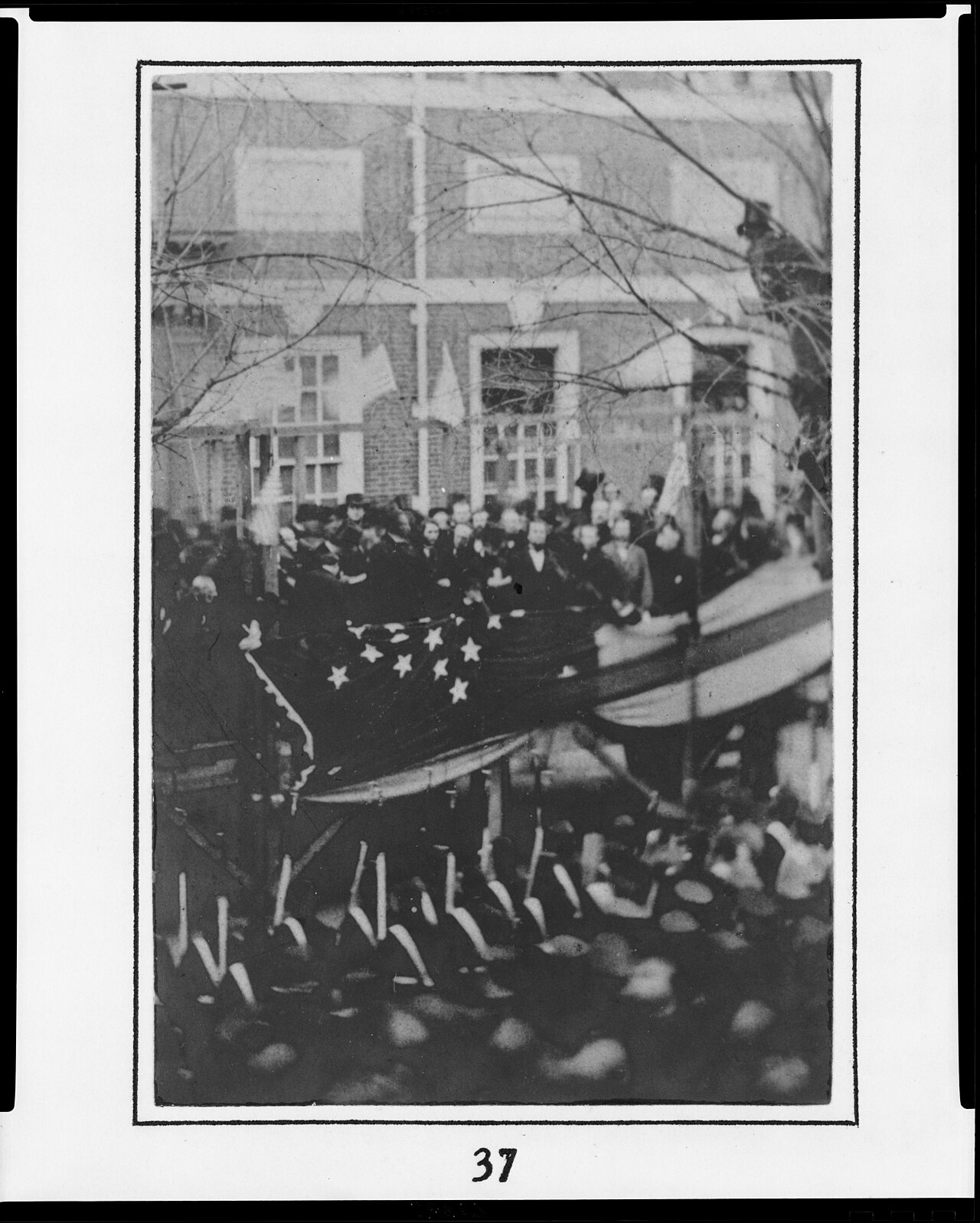 Crowd at Independence Hall as Lincoln raises a flag, February 22, 1861